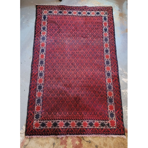 77 - A NICELY WOVEN FLOOR RUG BOKHARA STYLE, with main ground colour red, a repeat pattern to the centre ... 