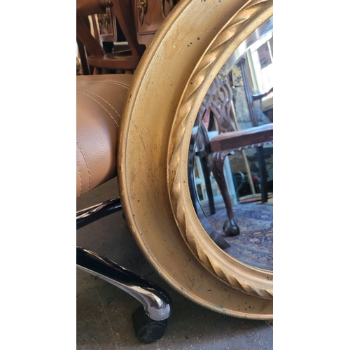 80 - A VERY GOOD QUALITY OVAL GILT WALL MIRROR – lovely ripple to the old mirror pane, with bevelled edge... 