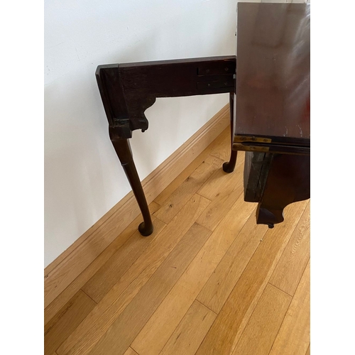 83 - AN IRISH MAHOGANY CARD TABLE, top with porringer corners, above frieze with shell motif to centre. S... 