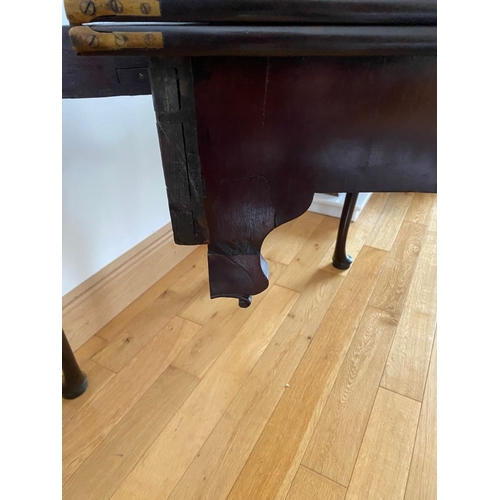 83 - AN IRISH MAHOGANY CARD TABLE, top with porringer corners, above frieze with shell motif to centre. S... 