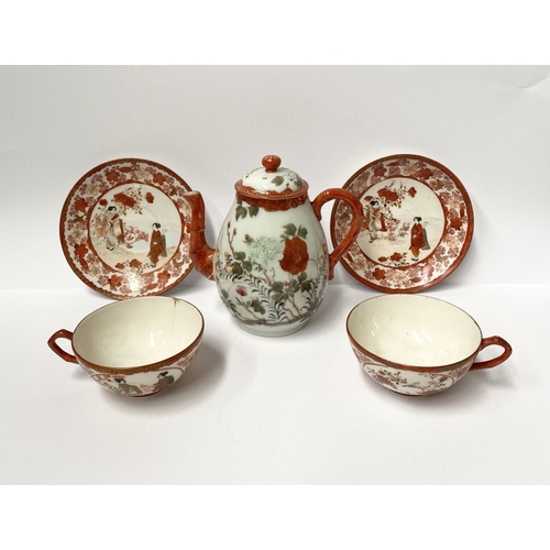 93 - A JAPANESE KUTANI TEA SERVICE, to include teapot, two cups and two saucers, each with beautiful pain... 