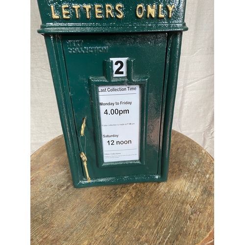 110 - A CAST IRON IRISH POST BOX, traditional form, with arched top above gilt harp, reading ‘letters only... 