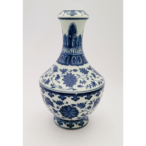 13 - A VERY GOOD CHINESE BLUE & WHITE GARLIC-BULB MOUTHED VASE, with Qianlong character mark to the base.... 