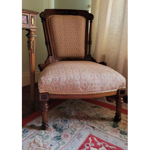 20 - A GOOD LATE 19TH CENTURY LOW RISE CHAIR, nicely upholstered in good quality fabric, the frame with t... 