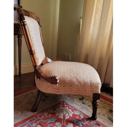 20 - A GOOD LATE 19TH CENTURY LOW RISE CHAIR, nicely upholstered in good quality fabric, the frame with t... 