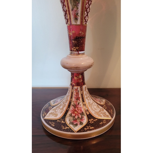 33 - A BEAUTIFUL PAIR OF MID-19TH CENTURY BOHEMIAN RUBY & WHITE OVERLAY VASES each of tulip form with a s... 