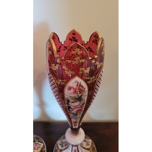 33 - A BEAUTIFUL PAIR OF MID-19TH CENTURY BOHEMIAN RUBY & WHITE OVERLAY VASES each of tulip form with a s... 