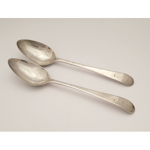 46 - A PAIR OF IRISH GEORGE III SILVER SERVLING SPOONS, engraved to the tips with an eagle over crown cre... 