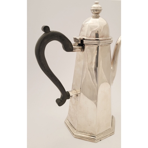 49 - AN IRISH LATE 20TH CENTURY SILVER COFFEE POT, of octagonal shape, with a finial top to the hinged li... 