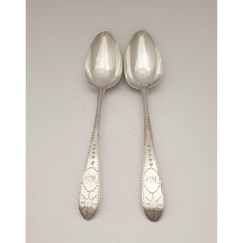 52 - A VERY FINE PAIR OF IRISH LATE 18TH CENTURY SILVER BRIGHTCUT DECORATED SERVING SPOONS, by John Osbor... 