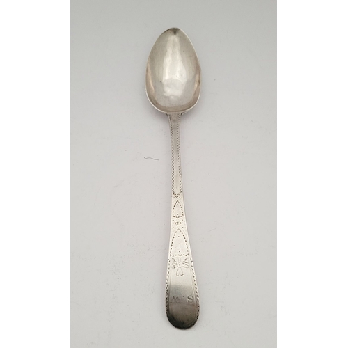 66 - A LATE 18TH CENTURY GEORGIAN BRIGHTCUT DECORATED SILVER SPOON BY GEORGE GRAY, the stem decorated all... 