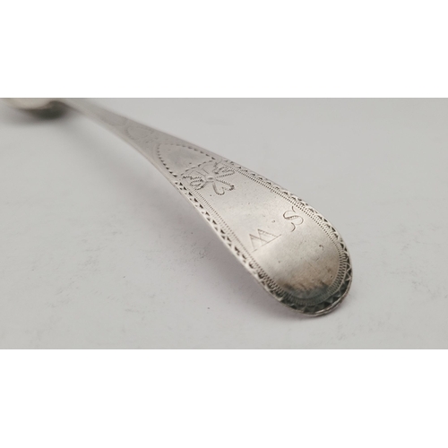 66 - A LATE 18TH CENTURY GEORGIAN BRIGHTCUT DECORATED SILVER SPOON BY GEORGE GRAY, the stem decorated all... 