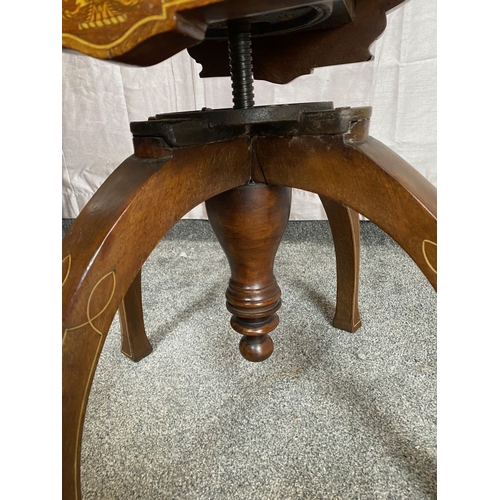 89 - AN EARLY 20TH CENTURY CURVED ADJUSTABLE PIANO / DRESSING STOOL, the seat is curved with upright bars... 