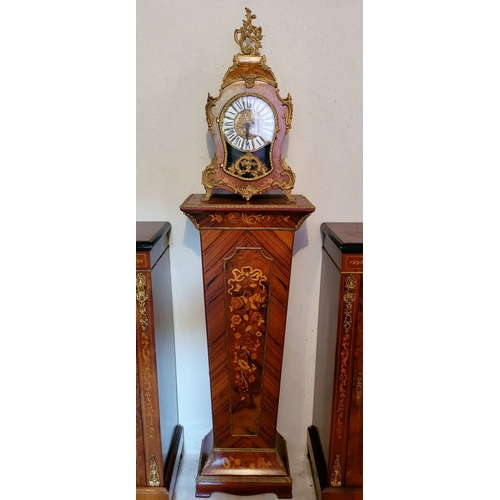 9 - A VINTAGE GERMAN FRANZ HERMLE ROCOCO STYLE MANTLE CLOCK, the shaped clock decorated with brass ormol... 