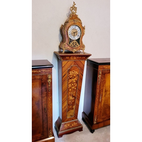 9 - A VINTAGE GERMAN FRANZ HERMLE ROCOCO STYLE MANTLE CLOCK, the shaped clock decorated with brass ormol... 