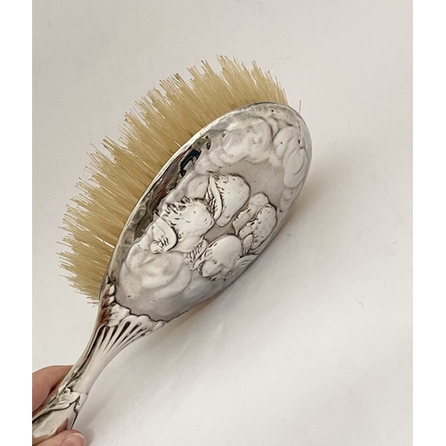 12 - A DECORATIVE EDWARD VII SILVER HAND MIRROR & HAIRBRUSH, by William Comyns & Sons, Manufacturing silv... 