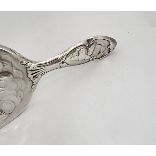 12 - A DECORATIVE EDWARD VII SILVER HAND MIRROR & HAIRBRUSH, by William Comyns & Sons, Manufacturing silv... 