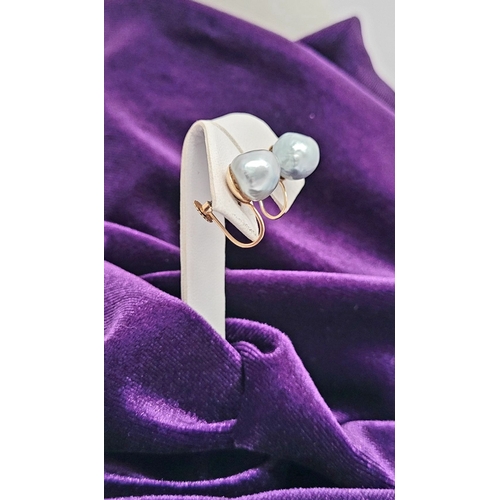 15 - A PAIR OF TWIST BACK 9CT YELLOW GOLD PEARL STUD EARRINGS, with a lovely natural silver-grey pearl to... 