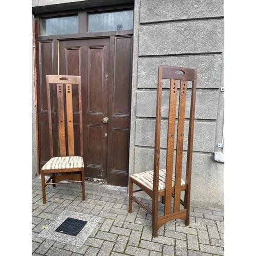 16 - A RARE PAIR OF SCOTTISH CHARLES RENNIE MACKINTOSH TEA ROOM CHAIRS, high backed chair with long uprig... 