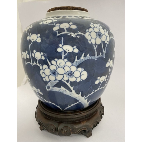 2 - A LATE QING DYNASTY CHINESE BLUE AND WHITE GINGER JAR WITH STAND, ginger jar of bulbous form, painte... 