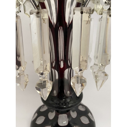 27 - A BEAUTIFUL DEEP RUBY AND CLEAR GLASS LUSTRE, overlaid and cut, with flared rim, tapered stem with k... 