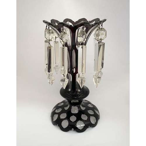 27 - A BEAUTIFUL DEEP RUBY AND CLEAR GLASS LUSTRE, overlaid and cut, with flared rim, tapered stem with k... 