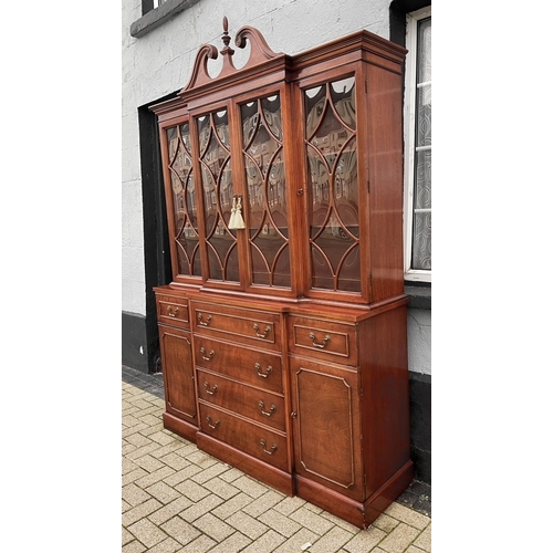 29 - AN EXCELLENT MAHOGANY BREAK FRONT SECRETAIRE BOOKCASE, with swan neck pediment over cornice above fo... 