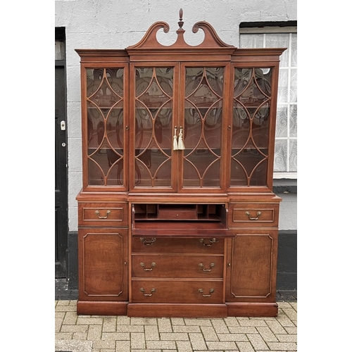 29 - AN EXCELLENT MAHOGANY BREAK FRONT SECRETAIRE BOOKCASE, with swan neck pediment over cornice above fo... 