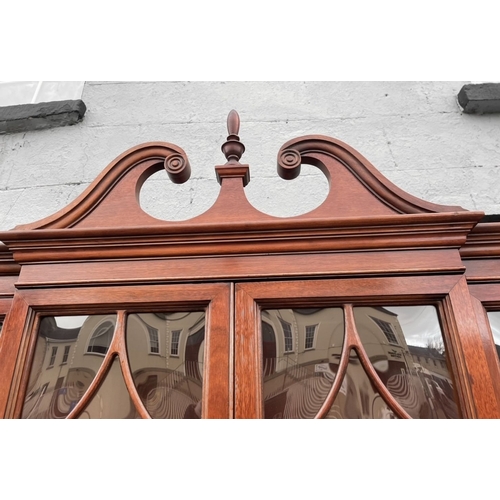 29 - AN EXCELLENT MAHOGANY BREAK FRONT SECRETAIRE BOOKCASE, with swan neck pediment over cornice above fo... 