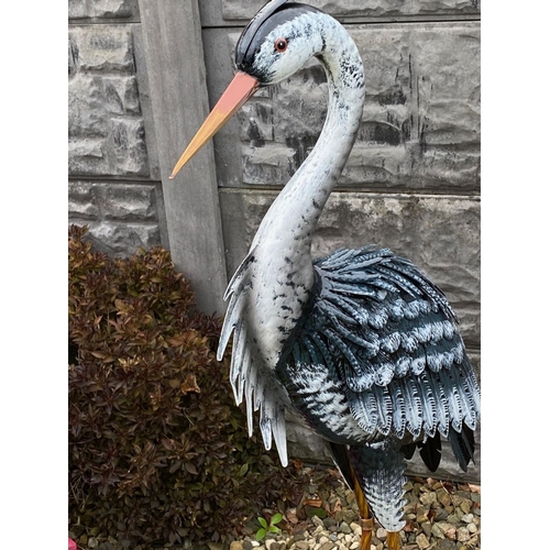 31 - A LARGE PAIR OF PAINTED STEEL GARDEN ORNAMENTS IN THE FORM OF HERONS, dimensions: 98cm high approx.