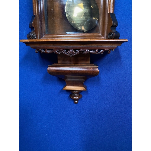 34 - AN EXCELLENT WALNUT VIENNA WALL CLOCK, the roman numeral dial with brass bezel behind arched glass c... 