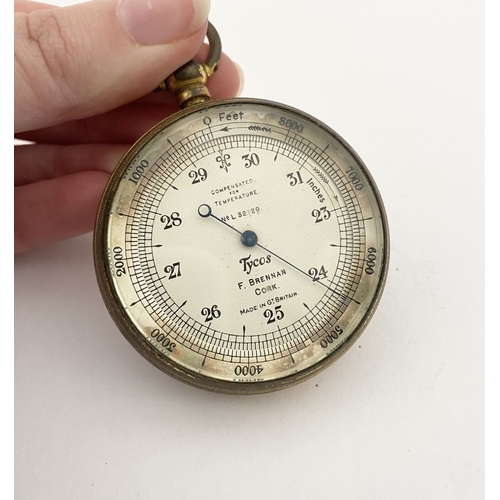 35 - A GOOD ANTIQUE ‘F. BRENNAN CORK’ POCKET BAROMETER, brass barometer, the dial reading ‘compensated fo... 