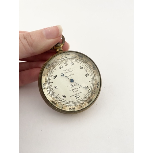 35 - A GOOD ANTIQUE ‘F. BRENNAN CORK’ POCKET BAROMETER, brass barometer, the dial reading ‘compensated fo... 