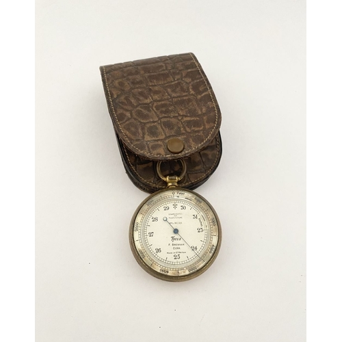 35 - A GOOD ANTIQUE ‘F. BRENNAN CORK’ POCKET BAROMETER, brass barometer, the dial reading ‘compensated fo... 