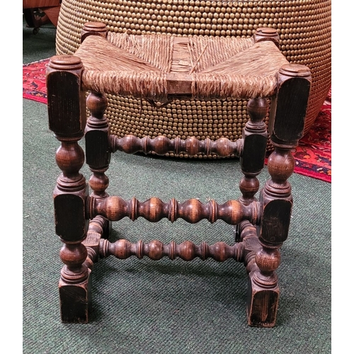 41 - A CHARMING ANTIQUE OAK WOVEN STRAW SEATED STOOL, with turned & square legs united by bobbin & ring t... 