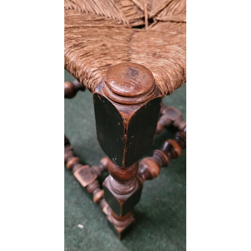 41 - A CHARMING ANTIQUE OAK WOVEN STRAW SEATED STOOL, with turned & square legs united by bobbin & ring t... 