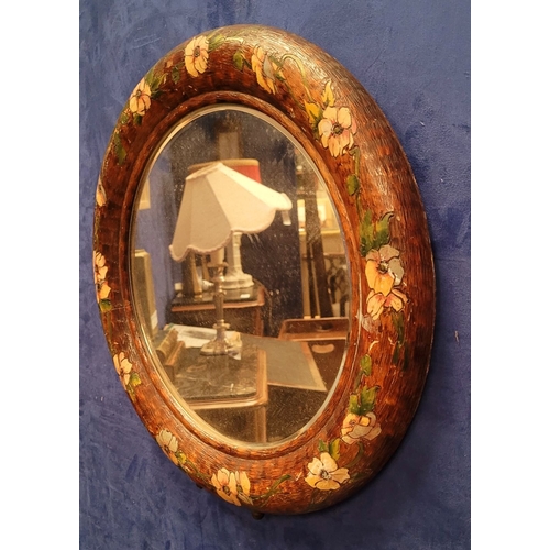 49 - AN UNUSUAL VINTAGE WALL / TABLE TOP MIRROR: the circular bevelled mirror is held in a rounded frame ... 