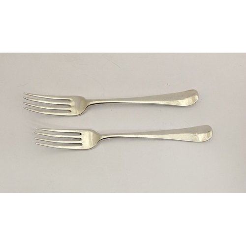 57 - A PAIR OF GEORGE III IRISH SILVER FORKS, by Michael Keating, Dublin c.1794, both hallmarked to under... 