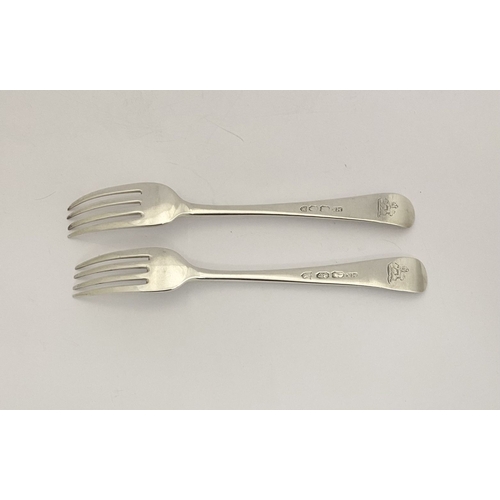 57 - A PAIR OF GEORGE III IRISH SILVER FORKS, by Michael Keating, Dublin c.1794, both hallmarked to under... 