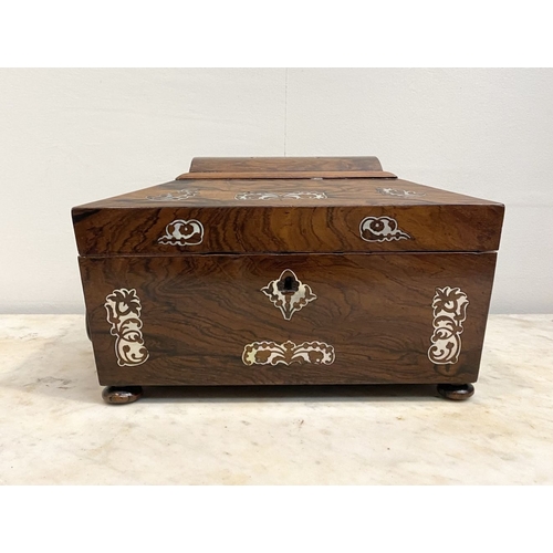 64 - AN EXCELLENT MAHOGANY MOTHER OF PEARL INLAID TEA CADDY BOX, sarcophagus shaped with decorative mothe... 