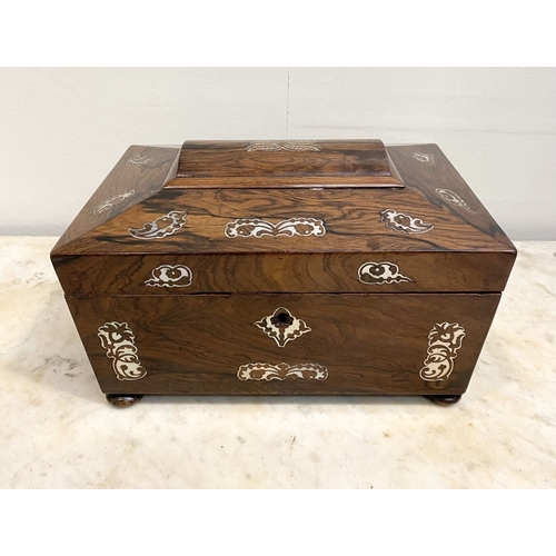 64 - AN EXCELLENT MAHOGANY MOTHER OF PEARL INLAID TEA CADDY BOX, sarcophagus shaped with decorative mothe... 