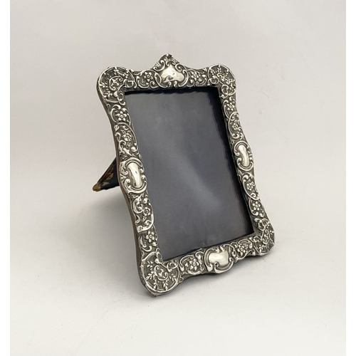 7 - A BEAUTIFUL EDWARD VII SILVER PHOTO FRAME, by Samuel M. Levi, Birmingham c.1900. The frame of rectan... 