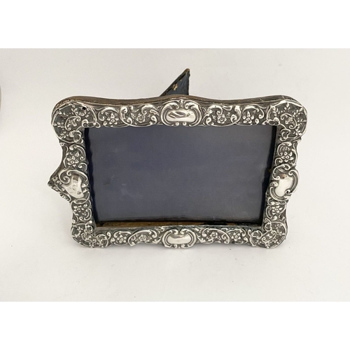 7 - A BEAUTIFUL EDWARD VII SILVER PHOTO FRAME, by Samuel M. Levi, Birmingham c.1900. The frame of rectan... 