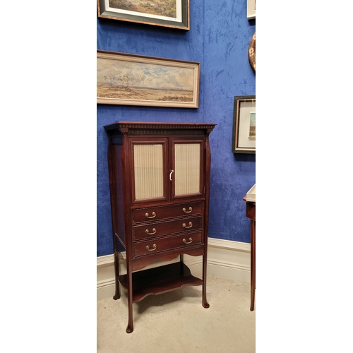 72 - A VERY FINE EDWARDIAN STONES PATENT GLAZED MUSIC CABINET,  with a double glazed cabinet door to the ... 