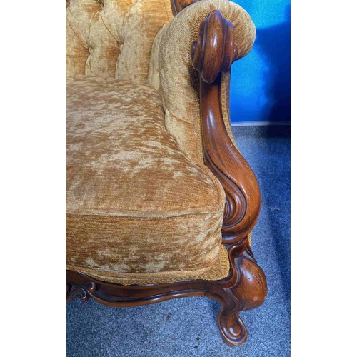 36 - A GOOD QUALITY VICTORIAN MAHOGANY FRAMED BUTTON BACKED TWO PERSON COUCH, with a serpentine shaped ba... 