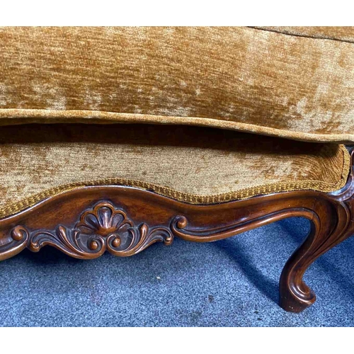 36 - A GOOD QUALITY VICTORIAN MAHOGANY FRAMED BUTTON BACKED TWO PERSON COUCH, with a serpentine shaped ba... 