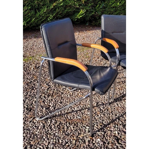 100 - A PAIR OF MODERN LEATHER & CHROME ARM CHAIRS, with curved metal frames & wooden rests to the curve. ... 