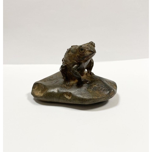 103 - PIERRE CHENET FOUNDRY (FRENCH, 20TH CENTURY), bronze sculpture in the form of a frog on stone, with ... 