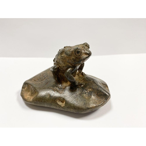 103 - PIERRE CHENET FOUNDRY (FRENCH, 20TH CENTURY), bronze sculpture in the form of a frog on stone, with ... 