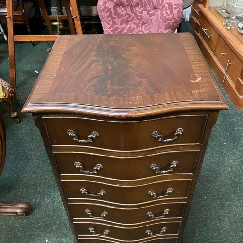 111 - A NEAT SIZED MAHOGANY CHEST OF DRAWERS, serpentine shaped, the top with crossbanded border and mould... 